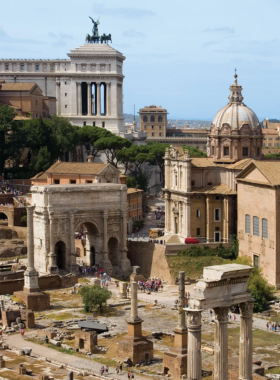 This image shows the Roman Forum with ancient ruins of temples, arches, and structures, highlighting the core of Roman public life.