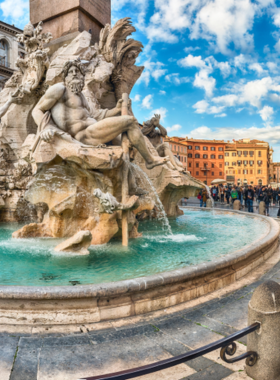  This image shows Piazza Navona, a vibrant Baroque square in Rome featuring fountains, cafes, and lively street performances.