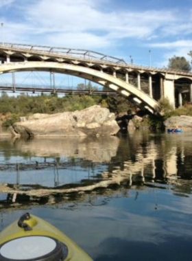  This image shows a peaceful trail along the American River Parkway, perfect for hiking or biking. The natural beauty of the area offers outdoor enthusiasts a chance to enjoy the tranquility of the river and surrounding wildlife.