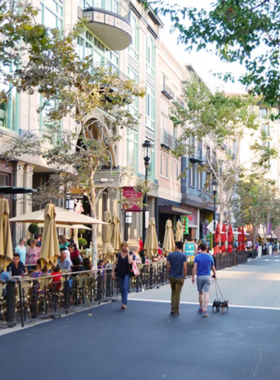  "This image shows Santana Row, a vibrant shopping district in San Jose, filled with luxurious boutiques, upscale restaurants, and beautiful European-inspired architecture, offering a relaxing shopping and dining experience."