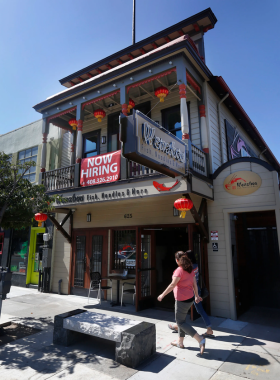  "This image shows a peaceful street scene in San Jose’s Japantown, with traditional Japanese shops, eateries, and vibrant cultural murals, showcasing the rich heritage of Japanese-American culture in the city."