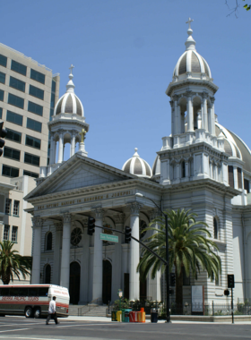 "This image shows the Cathedral Basilica of St. Joseph in San Jose, highlighting its majestic architecture with a beautiful dome and stained-glass windows, offering visitors a serene space for reflection and worship."