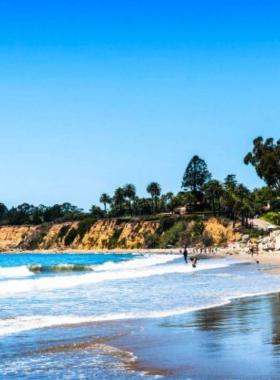 This image shows that the Pacific Coast Highway offers breathtaking views of the California coastline, with rugged cliffs and the ocean stretching as far as the eye can see, ideal for scenic drives.