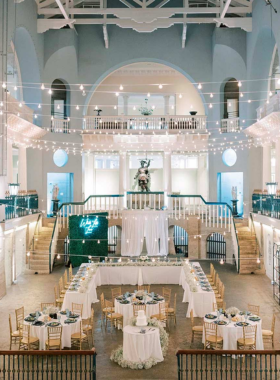 "This image shows the Lightner Museum in St. Augustine, housed in a stunning Spanish Renaissance building. It features a unique collection of 19th-century art, quirky items like shrunken heads, and antique furniture, making it a fascinating stop for museum lovers."