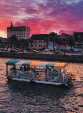 "This image shows a sunset cruise around the coastline of St. Augustine, offering stunning views of the city’s historic landmarks and picturesque waters. The cruise provides a relaxing way to end the day while capturing breathtaking photos of the sunset."