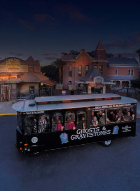 "This image shows a ghost tour in St. Augustine, where visitors explore the city’s haunted past with guided tours. They learn eerie stories about pirates, haunted houses, and spirits that are said to still roam the streets of the oldest city in the U.S."