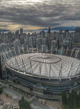 "This image shows a lively sporting event at BC Place Stadium in Vancouver, with enthusiastic fans cheering for their team, showcasing the stadium’s role in major events."

