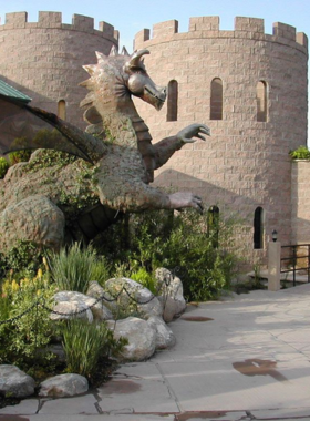 This image shows a close-up of an exotic animal at ABQ BioPark Zoo, surrounded by lush greenery and a natural habitat.