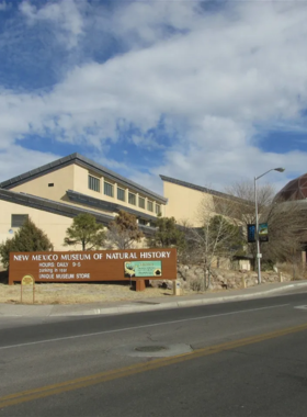 This image shows life-sized dinosaur replicas inside the New Mexico Museum of Natural History and Science in Albuquerque.