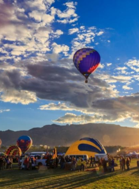 This image shows the open spaces at Balloon Fiesta Park, perfect for picnics and kite flying, with scenic views of Albuquerque.