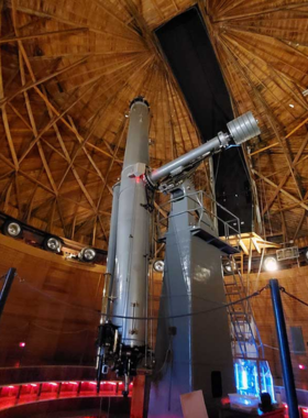 This image shows the iconic Lowell Observatory in Flagstaff, where visitors can observe celestial objects through telescopes and participate in stargazing events, offering a chance to learn about space exploration and astronomy.

