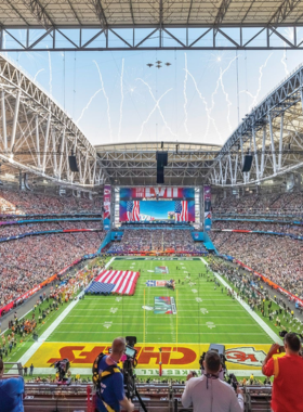 This image shows State Farm Stadium in Glendale, Arizona, an impressive venue hosting NFL games, concerts, and large-scale events, providing a state-of-the-art experience for visitors and sports fans alike in the heart of Arizona.