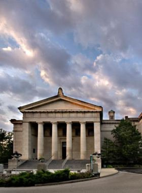 "This image shows the grand exterior of the Cincinnati Art Museum, an architectural masterpiece surrounded by lush gardens and offering a glimpse into the museum's rich cultural heritage."

