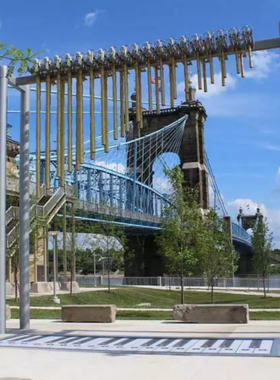 "This image shows the colorful carousel at Smale Riverfront Park, a popular family attraction offering rides with scenic views of the Ohio River and downtown Cincinnati."

