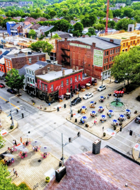 "This image shows the charming cobblestone streets and German-inspired architecture of MainStrasse Village, reflecting the district's rich cultural and immigrant heritage."