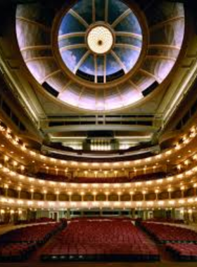 This image shows the architectural grandeur of Bass Performance Hall, a world-class venue for concerts, Broadway shows, and the arts. Its design, with angel sculptures at the entrance, symbolizes the high cultural standards of Fort Worth.