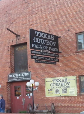  This image shows an exhibit inside the Texas Cowboy Hall of Fame, highlighting the Western legends and cowboy culture that shaped Texas. It celebrates the role of cowboys in the state’s history and modern rodeo traditions.

