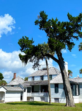 This image shows the historic Kingsley Plantation, featuring the preserved plantation house surrounded by lush greenery. It highlights the rich history of early Florida settlers and offers insight into the lives of enslaved people during colonial times.