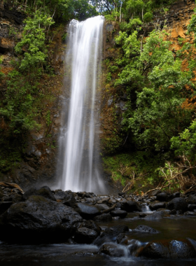 "This image shows Secret Falls, a hidden waterfall in Wailua River State Park, surrounded by dense jungle and offering a serene, peaceful retreat in Kaua’i."