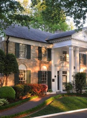 "This image shows the iconic Graceland mansion, home to Elvis Presley, in Memphis, where visitors explore the legacy of the King of Rock and Roll."