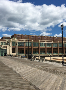  This image shows the iconic Asbury Park boardwalk, with lively music venues and colorful murals, showcasing its cultural and artistic vibrancy.