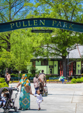  This image shows families enjoying rides on the historic carousel at Pullen Park, emphasizing its vintage charm and family-friendly atmosphere.