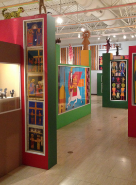 This image shows the Museum of International Folk Art, featuring a vast collection of folk art from around the world, highlighting global cultural traditions.