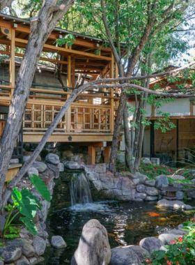 This image shows visitors relaxing in the natural hot springs near Santa Fe, with scenic desert landscapes and therapeutic waters providing a tranquil spa experience.