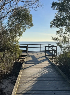 This image shows that Back Bay National Wildlife Refuge is a tranquil area with scenic trails, wildlife viewing opportunities, and beautiful landscapes perfect for hiking, birdwatching, and reconnecting with nature.