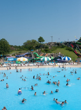 This image shows that Ocean Breeze Waterpark is a family-friendly destination with exciting water slides, wave pools, and lazy rivers, offering fun activities for all ages in a clean and well-maintained environment.