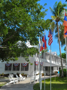 This image shows the Harry S. Truman Little White House in Key West, a historic landmark where President Truman stayed during his presidency. The house offers visitors a glimpse into the life of the president and his time in Key West.