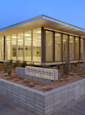 This image shows a gallery at the Palm Springs Art Museum, showcasing modern art exhibits with vibrant colors and contemporary sculptures, offering a cultural experience for visitors.
