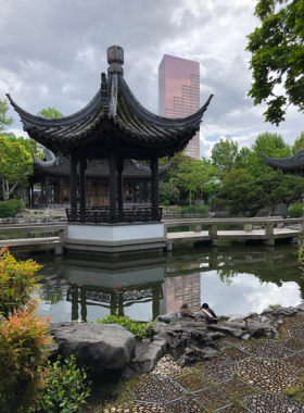 This image shows Lan Su Chinese Garden, a classical garden with Chinese architectural features, lush greenery, and peaceful water elements. It’s a tranquil oasis in Portland, offering visitors a serene and culturally rich experience.