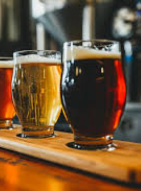 This image shows a selection of craft beers from Portland’s local breweries. The city is known for its craft beer culture, offering unique brews and flavors that visitors can enjoy at various breweries and beer halls.