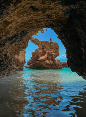 This image shows the dramatic cliffs of Cabo Rojo with the Los Morrillos Lighthouse perched at the edge. The red-tinged rock formations contrast with the blue sea, offering scenic coastal views and a glimpse into Puerto Rico’s preserved landscapes.