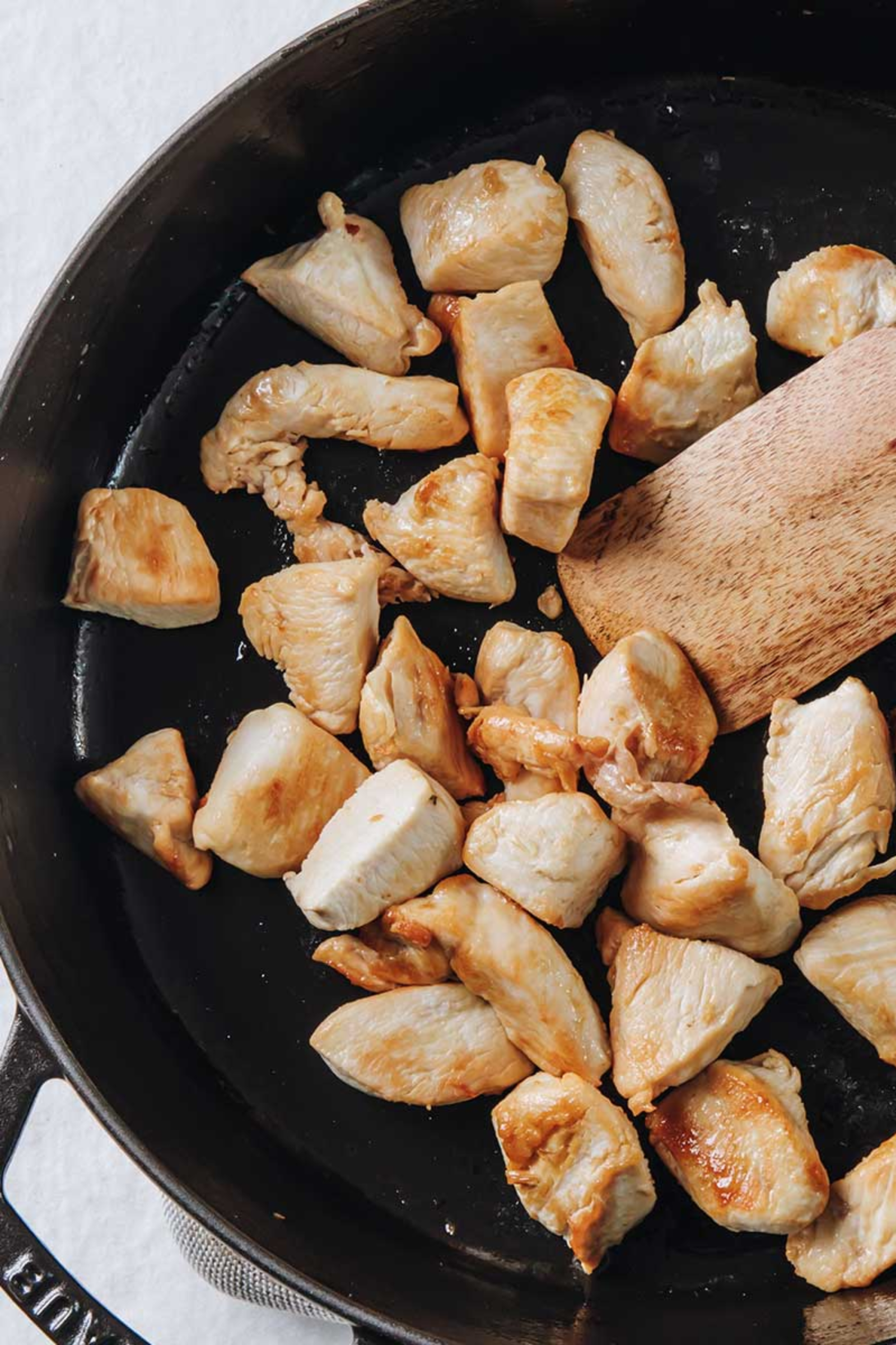 Add the chicken and cook
