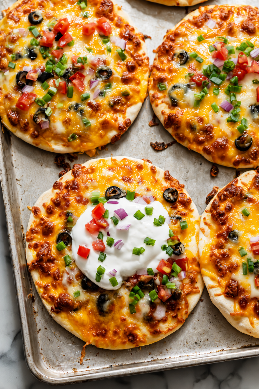 Broil or bake at 400°F until the cheese is melted and bubbly.
