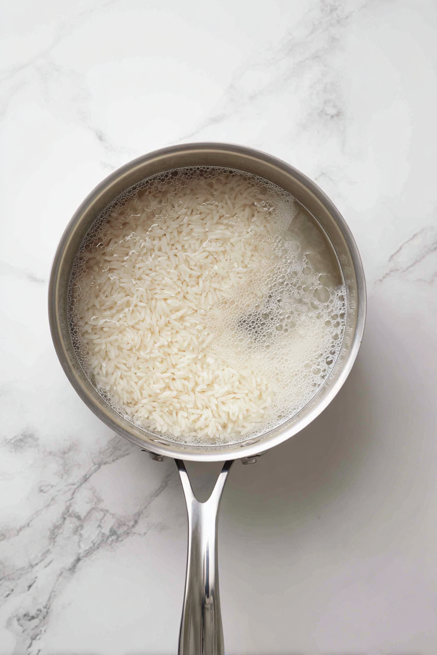 Cook the rice according to package instructions and set aside.