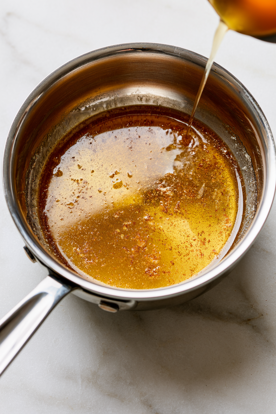 Start by melting the butter slowly in a saucepan over low heat, allowing it to brown slightly and develop a nutty aroma