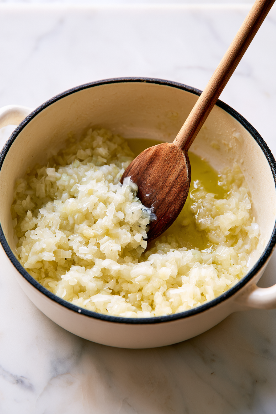 Heat olive oil in a large saucepan over medium heat. Add the chopped onion and sauté until translucent, about 5 minutes