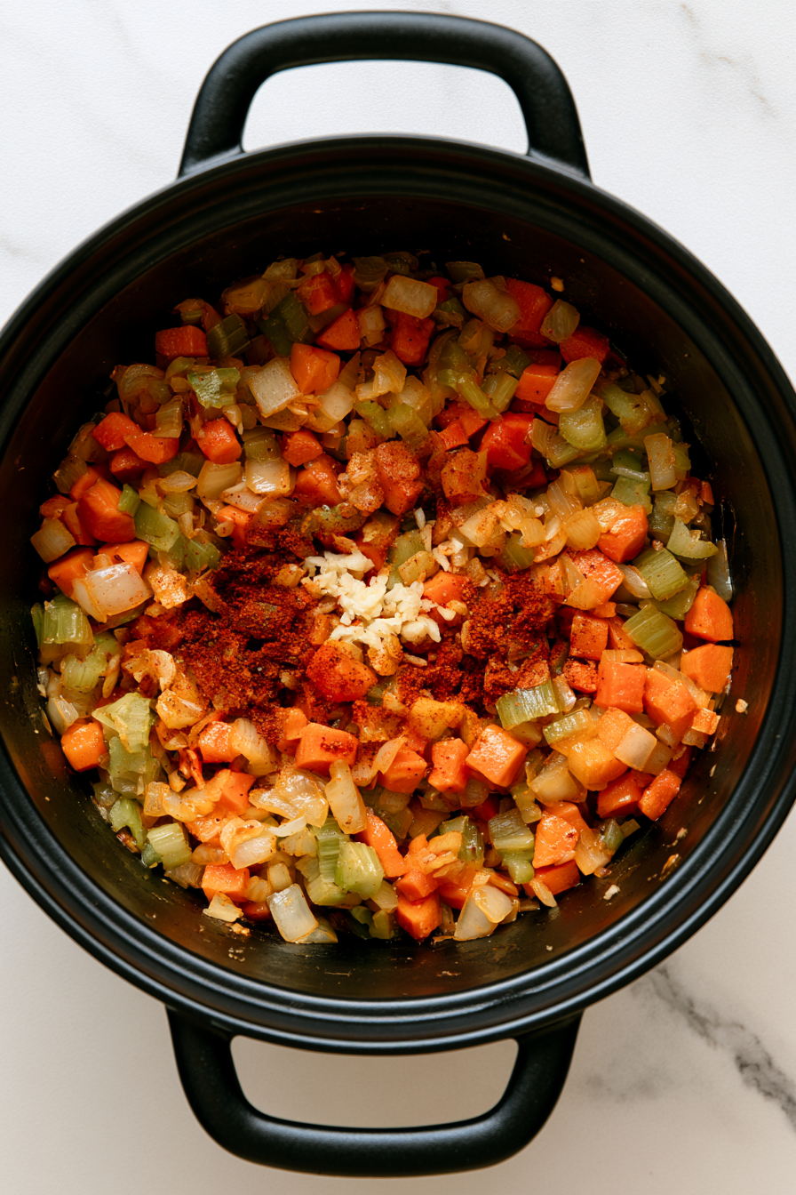 Stir in the minced garlic and smoked paprika, cooking for another minute until fragrant and slightly browned