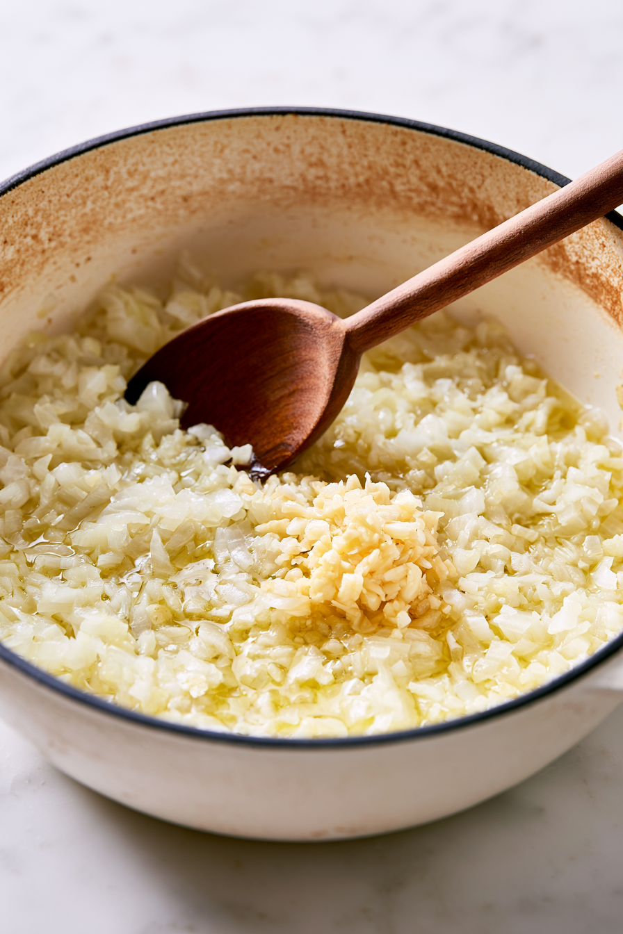 While the vegetables roast, heat a tablespoon of olive oil in a large pot over medium heat