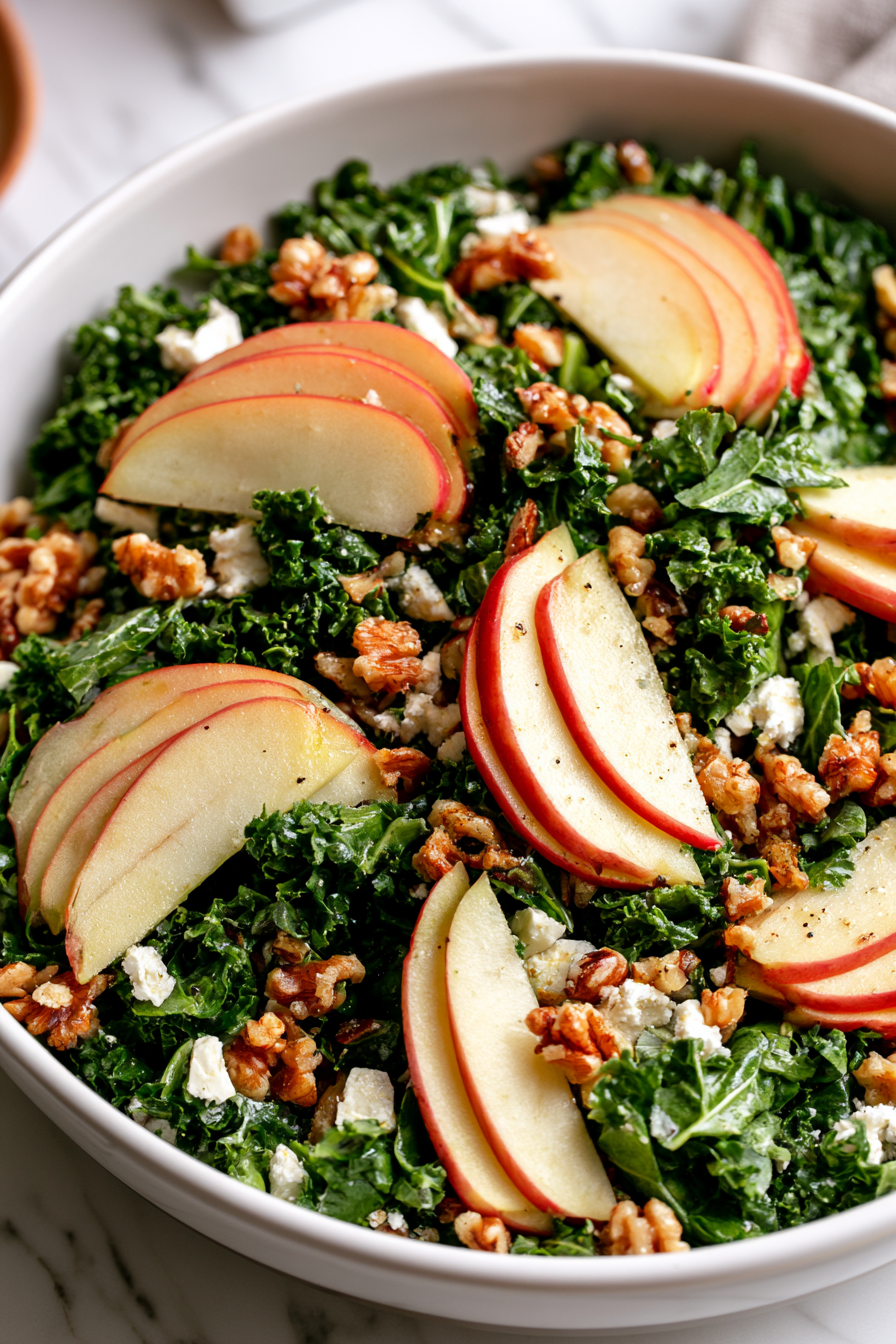 Arrange the thin apple slices on top, distributing them evenly for a fresh, crisp finish