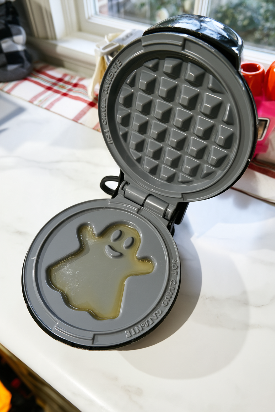 Preheat the ghost-shaped waffle maker according to the manufacturer’s instructions