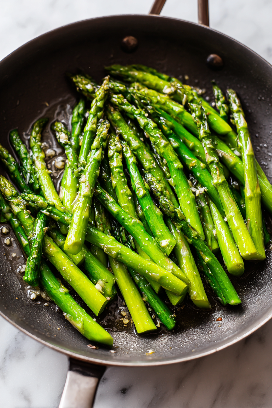 Add asparagus and cook for 3–4 minutes