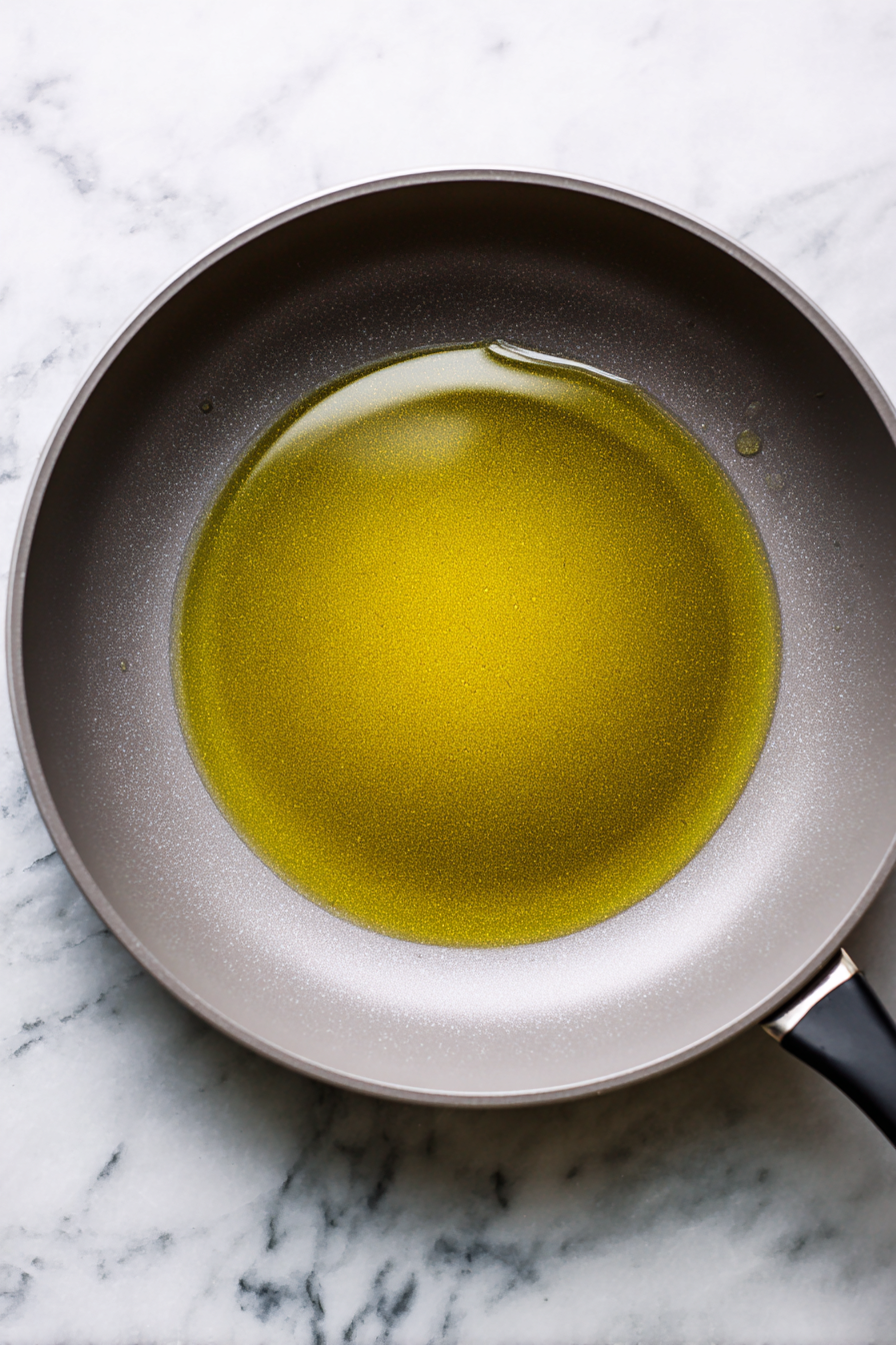Heat olive oil in a large skillet over medium heat