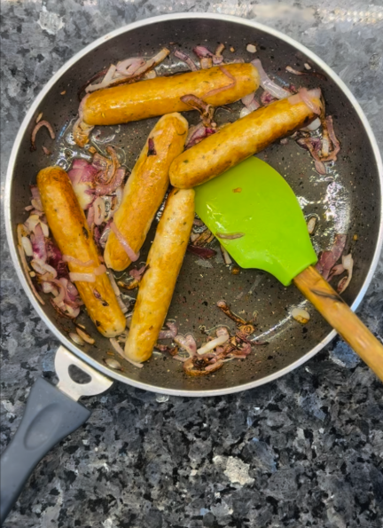 Add onions to the same pan and cook over medium heat