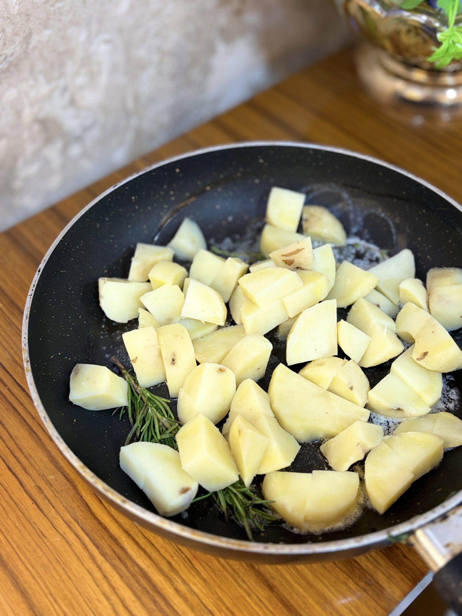 Add the diced potatoes to the pan