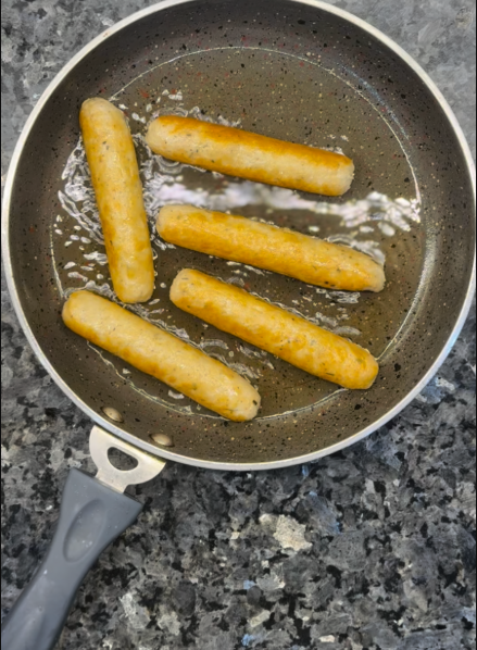 Brown the bratwurst, then remove and set aside