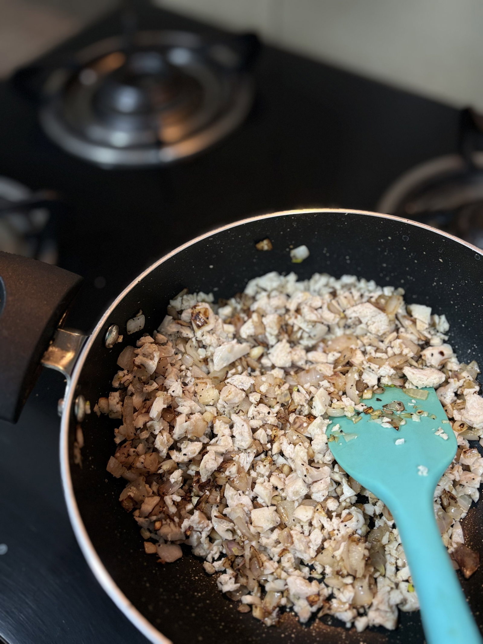 Cook until browned, breaking it apart with a spatula.